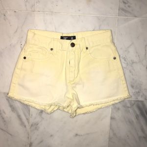 Yellow faded jean shorts